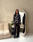 Aya Black With White Floral Mesh Asymmetrical Lined Top